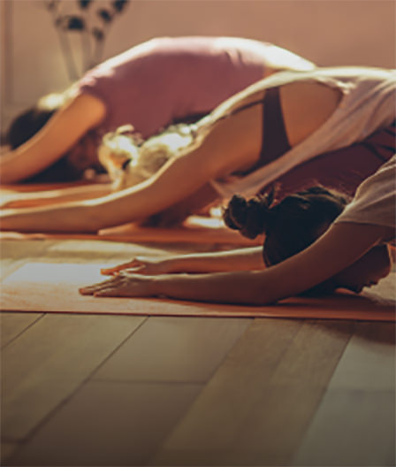 Women practicing yoga