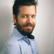 Headshot of Sam Hickmann